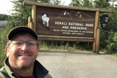 Taking a selfie at the sign