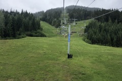 Taking on the high peak in the rain.